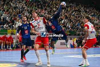 2024-01-18 - Dika Mem (France) in action against Veron Nacinovic (Croatia) during the Men’s EHF Euro 2024 match between France vs. Croatia at the Lanxess Arena in Berlin, Cologne - MEN'S EHF EURO 2024 - FRANCE VS CROATIA - HANDBALL - OTHER SPORTS