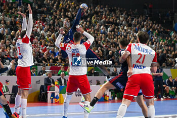 2024-01-18 - Dika Mem (France) in action against Zvonimir Srna (Croatia) during the Men’s EHF Euro 2024 match between France vs. Croatia at the Lanxess Arena in Berlin, Cologne - MEN'S EHF EURO 2024 - FRANCE VS CROATIA - HANDBALL - OTHER SPORTS