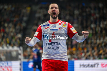 2024-01-18 - Happiness of Mario Sostaric (Croatia) after scores a goal during the Men’s EHF Euro 2024 match between France vs. Croatia at the Lanxess Arena in Berlin, Cologne - MEN'S EHF EURO 2024 - FRANCE VS CROATIA - HANDBALL - OTHER SPORTS