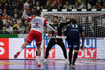 2024-01-18 - Mario Sostaric (Croatia) scores a goal from 7mt. throw during the Men’s EHF Euro 2024 match between France vs. Croatia at the Lanxess Arena in Berlin, Cologne - MEN'S EHF EURO 2024 - FRANCE VS CROATIA - HANDBALL - OTHER SPORTS