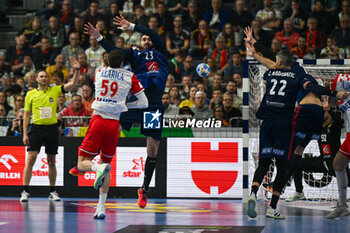 2024-01-18 - Luka Lovre Klarica (Croatia) in action against Ludovic Fabregas (France) during the Men’s EHF Euro 2024 match between France vs. Croatia at the Lanxess Arena in Berlin, Cologne - MEN'S EHF EURO 2024 - FRANCE VS CROATIA - HANDBALL - OTHER SPORTS