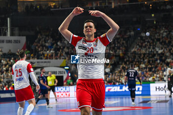 2024-01-18 - Happiness of Mateo Maras (Croatia) after scores a goal during the Men’s EHF Euro 2024 match between France vs. Croatia at the Lanxess Arena in Berlin, Cologne - MEN'S EHF EURO 2024 - FRANCE VS CROATIA - HANDBALL - OTHER SPORTS