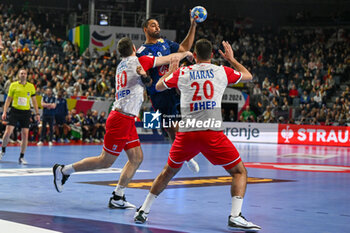 2024-01-18 - Melvyn Richardson (France) in action against Marko Mamic (Croatia) and Mateo Maras (Croatia) during the Men’s EHF Euro 2024 match between France vs. Croatia at the Lanxess Arena in Berlin, Cologne - MEN'S EHF EURO 2024 - FRANCE VS CROATIA - HANDBALL - OTHER SPORTS