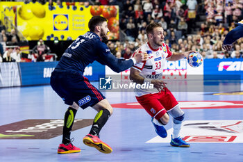 2024-01-18 - Ludovic Fabregas of France and Luka Cindric of Croatia during the Men's EHF Euro 2024, Main Round, handball match between France and Croatia on January 18, 2024 at Lanxess-Arena in Cologne, Germany - HANDBALL - MEN'S EHF EURO 2024 - FRANCE V CROATIA - HANDBALL - OTHER SPORTS