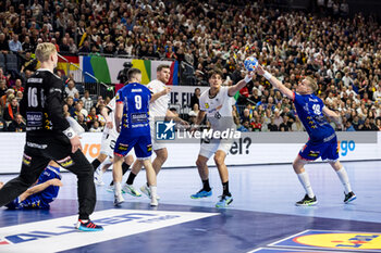 2024-01-18 - Julian Köster of Germany and Ellidi Vidarsson of Iceland during the Men's EHF Euro 2024, Main Round, handball match between Germany and Iceland on January 18, 2024 at Lanxess-Arena in Cologne, Germany - HANDBALL - MEN'S EHF EURO 2024 - GERMANY V ICELAND - HANDBALL - OTHER SPORTS
