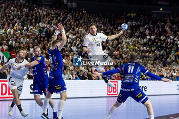 2024-01-18 - Christoph Steinert of Germany and Ellidi Vidarsson, Ymir Gislason of Iceland during the Men's EHF Euro 2024, Main Round, handball match between Germany and Iceland on January 18, 2024 at Lanxess-Arena in Cologne, Germany - HANDBALL - MEN'S EHF EURO 2024 - GERMANY V ICELAND - HANDBALL - OTHER SPORTS