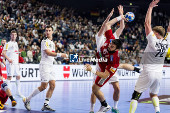 2024-01-18 - Miklos Rosta of Hungary and Michael Miskovez, Lukas Hutecek of Austria during the Men's EHF Euro 2024, Main Round, handball match between Hungary and Austria on January 18, 2024 at Lanxess-Arena in Cologne, Germany - HANDBALL - MEN'S EHF EURO 2024 - HUNGARY V AUSTRIA - HANDBALL - OTHER SPORTS