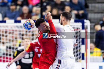 2024-01-22 - Eric Damböck of Austria and Nedim Remili of France during the Men's EHF Euro 2024, Main Round, handball match between France and Austria on January 22, 2024 at Lanxess-Arena in Cologne, Germany - HANDBALL - MEN'S EHF EURO 2024 - FRANCE V AUSTRIA - HANDBALL - OTHER SPORTS