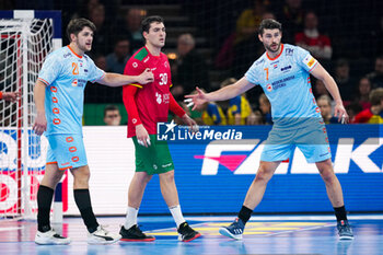 2024-01-23 - Martijn Kleijkers of The Netherlands, Gustavo Capdeville of Portugal and Robin Schoenaker of The Netherlands during the Men's EHF Euro 2024, Main Round, handball match between Netherlands and Portugal on January 23, 2024 at Barclays Arena in Hamburg, Germany - HANDBALL - MEN'S EHF EURO 2024 - NETHERLANDS V PORTUGAL - HANDBALL - OTHER SPORTS