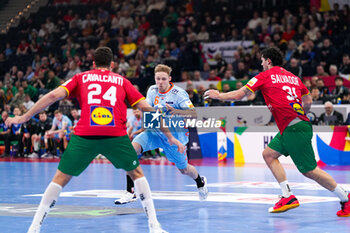 2024-01-23 - Niko Blaauw of The Netherlands and Alexandre Cavalcanti, Salvador Salvador of Portugal during the Men's EHF Euro 2024, Main Round, handball match between Netherlands and Portugal on January 23, 2024 at Barclays Arena in Hamburg, Germany - HANDBALL - MEN'S EHF EURO 2024 - NETHERLANDS V PORTUGAL - HANDBALL - OTHER SPORTS