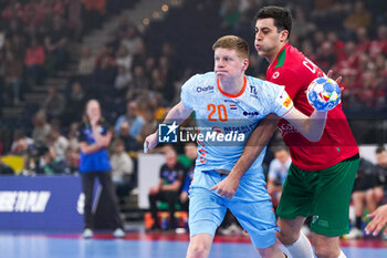 2024-01-23 - Niels Versteijnen of The Netherlands and Alexandre Cavalcanti of Portugal during the Men's EHF Euro 2024, Main Round, handball match between Netherlands and Portugal on January 23, 2024 at Barclays Arena in Hamburg, Germany - HANDBALL - MEN'S EHF EURO 2024 - NETHERLANDS V PORTUGAL - HANDBALL - OTHER SPORTS