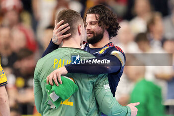 2024-01-26 - Elohim Prandi of France with goalkeeper Andreas Palicka of Sweden during the Men's EHF Euro 2024, Semi Finals handball match between France and Sweden on January 26, 2024 at Lanxess-Arena in Cologne, Germany - HANDBALL - MEN'S EHF EURO 2024 - FRANCE V SWEDEN - HANDBALL - OTHER SPORTS