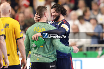 2024-01-26 - Elohim Prandi of France with goalkeeper Andreas Palicka of Sweden during the Men's EHF Euro 2024, Semi Finals handball match between France and Sweden on January 26, 2024 at Lanxess-Arena in Cologne, Germany - HANDBALL - MEN'S EHF EURO 2024 - FRANCE V SWEDEN - HANDBALL - OTHER SPORTS