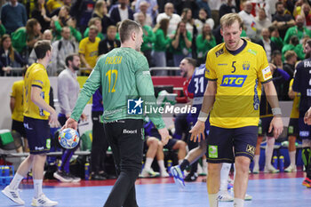 2024-01-26 - Andreas Palicka and Max Darj of Sweden look dejected during the Men's EHF Euro 2024, Semi Finals handball match between France and Sweden on January 26, 2024 at Lanxess-Arena in Cologne, Germany - HANDBALL - MEN'S EHF EURO 2024 - FRANCE V SWEDEN - HANDBALL - OTHER SPORTS