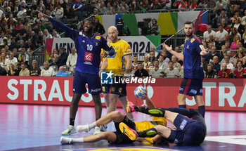 2024-01-26 - Dika Mem and Nedim Remili of France during the Men's EHF Euro 2024, Semi Finals handball match between France and Sweden on January 26, 2024 at Lanxess-Arena in Cologne, Germany - HANDBALL - MEN'S EHF EURO 2024 - FRANCE V SWEDEN - HANDBALL - OTHER SPORTS