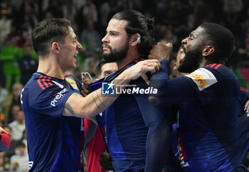 2024-01-26 - Elohim Prandi of France celebrates his goal in the last second of normal time to give France extra time during the Men's EHF Euro 2024, Semi Finals handball match between France and Sweden on January 26, 2024 at Lanxess-Arena in Cologne, Germany - HANDBALL - MEN'S EHF EURO 2024 - FRANCE V SWEDEN - HANDBALL - OTHER SPORTS