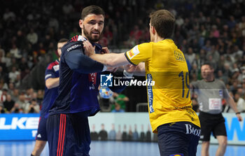 2024-01-26 - Ludovic Fabregas of France and Felix Claar of Sweden during the Men's EHF Euro 2024, Semi Finals handball match between France and Sweden on January 26, 2024 at Lanxess-Arena in Cologne, Germany - HANDBALL - MEN'S EHF EURO 2024 - FRANCE V SWEDEN - HANDBALL - OTHER SPORTS