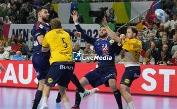 2024-01-26 - Nedim Remili of France and Ludovic Fabregas during the Men's EHF Euro 2024, Semi Finals handball match between France and Sweden on January 26, 2024 at Lanxess-Arena in Cologne, Germany - HANDBALL - MEN'S EHF EURO 2024 - FRANCE V SWEDEN - HANDBALL - OTHER SPORTS
