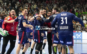 2024-01-26 - Elohim Prandi of France celebrates his goal in the last second of normal time to give France extra time during the Men's EHF Euro 2024, Semi Finals handball match between France and Sweden on January 26, 2024 at Lanxess-Arena in Cologne, Germany - HANDBALL - MEN'S EHF EURO 2024 - FRANCE V SWEDEN - HANDBALL - OTHER SPORTS