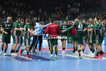 2024-01-26 - Hungary players celebrate at full time during the Men's EHF Euro 2024, Placement match 5/6, handball match between Hungary and Slovenia on January 26, 2024 at Lanxess-Arena in Cologne, Germany - HANDBALL - MEN'S EHF EURO 2024 - HUNGARY V SLOVENIA - HANDBALL - OTHER SPORTS