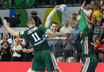 2024-01-26 - Miha Zarabec of Slovenia and Patrik Ligetvari of Hungary during the Men's EHF Euro 2024, Placement match 5/6, handball match between Hungary and Slovenia on January 26, 2024 at Lanxess-Arena in Cologne, Germany - HANDBALL - MEN'S EHF EURO 2024 - HUNGARY V SLOVENIA - HANDBALL - OTHER SPORTS