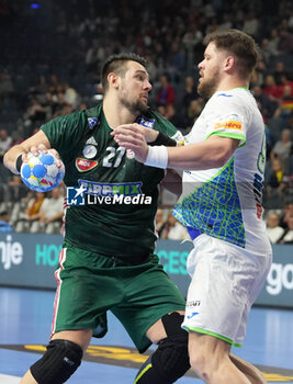 2024-01-26 - Bence Banhidi of Hungary and Matic Suholeznik of Slovenia during the Men's EHF Euro 2024, Placement match 5/6, handball match between Hungary and Slovenia on January 26, 2024 at Lanxess-Arena in Cologne, Germany - HANDBALL - MEN'S EHF EURO 2024 - HUNGARY V SLOVENIA - HANDBALL - OTHER SPORTS