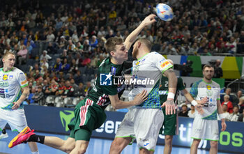 2024-01-26 - Bence Imre of Hungary and Borut Mackovsek of Slovenia during the Men's EHF Euro 2024, Placement match 5/6, handball match between Hungary and Slovenia on January 26, 2024 at Lanxess-Arena in Cologne, Germany - HANDBALL - MEN'S EHF EURO 2024 - HUNGARY V SLOVENIA - HANDBALL - OTHER SPORTS