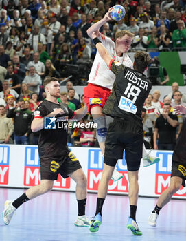 2024-01-26 - Simon Bogetoft Pytlick of Denmark and Julian Köster of Germany during the Men's EHF Euro 2024, Semi Finals handball match between Germany and Denmark on January 26, 2024 at Lanxess-Arena in Cologne, Germany - HANDBALL - MEN'S EHF EURO 2024 - GERMANY V DENMARK - HANDBALL - OTHER SPORTS