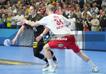 2024-01-26 - Juri Knorr of Germany and Simon Hald Jensen of Denmark during the Men's EHF Euro 2024, Semi Finals handball match between Germany and Denmark on January 26, 2024 at Lanxess-Arena in Cologne, Germany - HANDBALL - MEN'S EHF EURO 2024 - GERMANY V DENMARK - HANDBALL - OTHER SPORTS