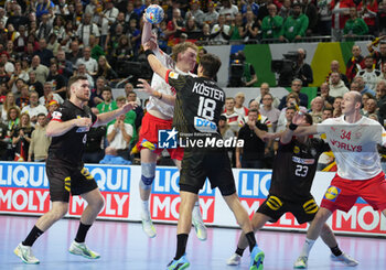 2024-01-26 - Simon Bogetoft Pytlick of Denmark and Julian Köster of Germany during the Men's EHF Euro 2024, Semi Finals handball match between Germany and Denmark on January 26, 2024 at Lanxess-Arena in Cologne, Germany - HANDBALL - MEN'S EHF EURO 2024 - GERMANY V DENMARK - HANDBALL - OTHER SPORTS