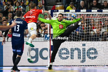 2024-01-28 - Samir Bellahcene (France) saves the ball during 2nd and 1st place final of the Men’s EHF Euro 2024 match between France vs Denmark at the Lanxess Arena, Cologne, Germany - MEN'S EHF EURO 2024 - FINAL - FRANCE VS DENMARK - HANDBALL - OTHER SPORTS
