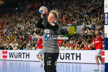 2024-01-28 - Emil Nielsen (Denmark) saves the ball during 2nd and 1st place final of the Men’s EHF Euro 2024 match between France vs Denmark at the Lanxess Arena, Cologne, Germany - MEN'S EHF EURO 2024 - FINAL - FRANCE VS DENMARK - HANDBALL - OTHER SPORTS