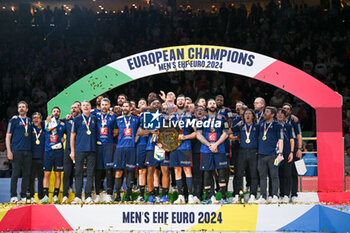 2024-01-28 - Happiness of France team lined up for the national anthems after win the Men’s EHF Euro 2024 match between France vs Denmark at the Lanxess Arena, Cologne, Germany - MEN'S EHF EURO 2024 - FINAL - FRANCE VS DENMARK - HANDBALL - OTHER SPORTS