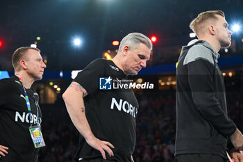 2024-01-28 - Head coach Jacobsen Nikolaj (Denmark) shows his disappointment after loose the final of the Men’s EHF Euro 2024 match between France vs Denmark at the Lanxess Arena, Cologne, Germany - MEN'S EHF EURO 2024 - FINAL - FRANCE VS DENMARK - HANDBALL - OTHER SPORTS