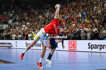 2024-01-28 - 7m throw Mikkel Hansen (Denmark) during 2nd and 1st place final of the Men’s EHF Euro 2024 match between France vs Denmark at the Lanxess Arena, Cologne, Germany - MEN'S EHF EURO 2024 - FINAL - FRANCE VS DENMARK - HANDBALL - OTHER SPORTS