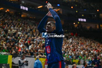 2024-01-28 - Dylan Nahi (France) incites the fans during 2nd and 1st place final of the Men’s EHF Euro 2024 match between France vs Denmark at the Lanxess Arena, Cologne, Germany - MEN'S EHF EURO 2024 - FINAL - FRANCE VS DENMARK - HANDBALL - OTHER SPORTS