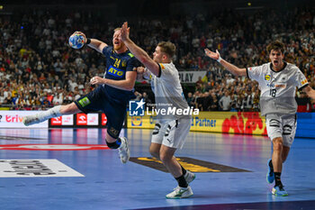 2024-01-28 - Jim Gottfridsson (Sweden) during 3rd and 4th place final of the Men’s EHF Euro 2024 match between Sweden vs Germany at the Lanxess Arena, Cologne, Germany - MEN'S EHF EURO 2024 - PLACEMENT MATCH 3/4 - SWEDEN VS GERMANY  - HANDBALL - OTHER SPORTS