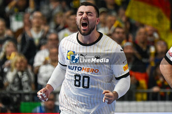 2024-01-28 - Happiness of Jannik Kohlbacher (Germany) after scores a goal during 3rd and 4th place final of the Men’s EHF Euro 2024 match between Sweden vs Germany at the Lanxess Arena, Cologne, Germany - MEN'S EHF EURO 2024 - PLACEMENT MATCH 3/4 - SWEDEN VS GERMANY  - HANDBALL - OTHER SPORTS