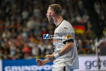 2024-01-28 - Happiness of Philipp Weber (Germany) after scores a goal during 3rd and 4th place final of the Men’s EHF Euro 2024 match between Sweden vs Germany at the Lanxess Arena, Cologne, Germany - MEN'S EHF EURO 2024 - PLACEMENT MATCH 3/4 - SWEDEN VS GERMANY  - HANDBALL - OTHER SPORTS