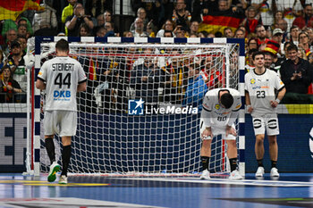 2024-01-28 - Germany show disappointment at the end 3rd and 4th place final of the Men’s EHF Euro 2024 match between Sweden vs Germany at the Lanxess Arena, Cologne, Germany - MEN'S EHF EURO 2024 - PLACEMENT MATCH 3/4 - SWEDEN VS GERMANY  - HANDBALL - OTHER SPORTS