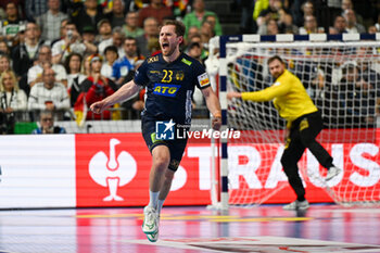 2024-01-28 - Happiness of Albin Lagergren (Sweden) after scores a goal during 3rd and 4th place final of the Men’s EHF Euro 2024 match between Sweden vs Germany at the Lanxess Arena, Cologne, Germany - MEN'S EHF EURO 2024 - PLACEMENT MATCH 3/4 - SWEDEN VS GERMANY  - HANDBALL - OTHER SPORTS