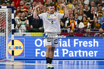 2024-01-28 - Johannes Golla (Germany) ask support from Germany's fans during 3rd and 4th place final of the Men’s EHF Euro 2024 match between Sweden vs Germany at the Lanxess Arena, Cologne, Germany - MEN'S EHF EURO 2024 - PLACEMENT MATCH 3/4 - SWEDEN VS GERMANY  - HANDBALL - OTHER SPORTS