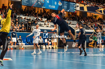 2024-03-06 - Kent Robin Tonnesen of PSG and Roland Mikler of Pick Szeged during the EHF Champions League, Group A handball match between Paris Saint-Germain and OTP Bank - Pick Szeged on March 6, 2024 at Pierre de Coubertin stadium in Paris, France - HANDBALL - CHAMPIONS LEAGUE - PARIS SG V PICK SZEGED - HANDBALL - OTHER SPORTS