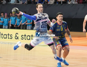 2024-03-30 - Romain Briffe of Cesson Rennes and Jonathan Mapu of Saint-Raphael during the French championship, Liqui Moly Starligue handball match between Cesson Rennes MH and Saint-Raphael VH on March 30, 2024 at the Glaz Arena in Cesson-Sévigné, France - HANDBALL - FRENCH CHAMP - CESSON RENNES V SAINT RAPHAEL - HANDBALL - OTHER SPORTS