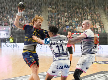 2024-03-30 - Kasper Kisum of Saint-Raphael and Sylvain Hochet, Romaric Guillo of Cesson Rennes during the French championship, Liqui Moly Starligue handball match between Cesson Rennes MH and Saint-Raphael VH on March 30, 2024 at the Glaz Arena in Cesson-Sévigné, France - HANDBALL - FRENCH CHAMP - CESSON RENNES V SAINT RAPHAEL - HANDBALL - OTHER SPORTS