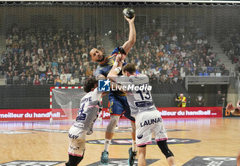 2024-03-30 - Micke Brasseleur of Saint-Raphael and Romain Briffe, Matheo Briffe of Cesson Rennes during the French championship, Liqui Moly Starligue handball match between Cesson Rennes MH and Saint-Raphael VH on March 30, 2024 at the Glaz Arena in Cesson-Sévigné, France - HANDBALL - FRENCH CHAMP - CESSON RENNES V SAINT RAPHAEL - HANDBALL - OTHER SPORTS