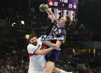 2024-04-07 - Thibaud Briet of Nantes and Nikola Karabatic of PSG during the French championship, Liqui Moly Starligue handball match between HBC Nantes and Paris Saint-Germain on April 7, 2024 at H Arena in Nantes, France - HANDBALL - FRENCH CHAMP - NANTES V PARIS SG - HANDBALL - OTHER SPORTS