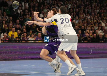2024-04-07 - Thibaud Briet of Nantes and Mathieu Grébille of PSG during the French championship, Liqui Moly Starligue handball match between HBC Nantes and Paris Saint-Germain on April 7, 2024 at H Arena in Nantes, France - HANDBALL - FRENCH CHAMP - NANTES V PARIS SG - HANDBALL - OTHER SPORTS