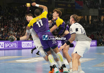 2024-04-07 - Kamil Syprzak of PSG and Jérémy Toto, Thibaud Briet of Nantes during the French championship, Liqui Moly Starligue handball match between HBC Nantes and Paris Saint-Germain on April 7, 2024 at H Arena in Nantes, France - HANDBALL - FRENCH CHAMP - NANTES V PARIS SG - HANDBALL - OTHER SPORTS