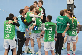 2024-04-30 - Füchse Berlin players celebrate at full time during the EHF European League, Quarter-finals, 2nd leg handball match between HBC Nantes and Füchse Berlin on April 30, 2024 at H Arena in Nantes, France - HANDBALL - EHF EUROPEAN LEAGUE - NANTES V BERLIN - HANDBALL - OTHER SPORTS